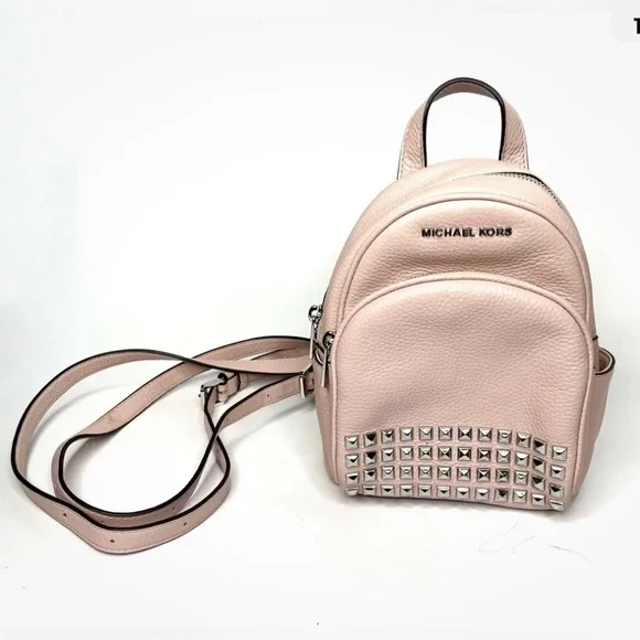 Michael Kors “Abbey” Studded Pebble Leather Mini Backpack In Ballet Pink Michael Kors. Pink with gold hardware. MSRP $348 main image 2